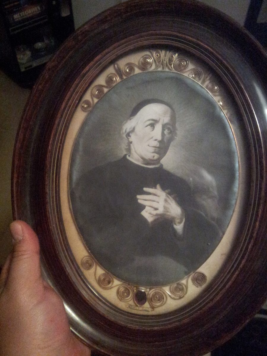 Portrait of Saint Giuseppe Benedetto Cottolengo, containing an ex indumentis relic fragment of the Saint